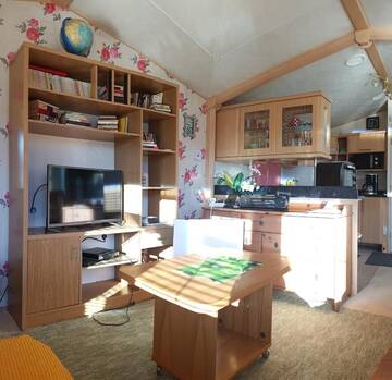 Фото номера Дом с 2 спальнями Дома для отпуска Romantic HOLIDAY HOME in the pine forest г. Скулте 9
