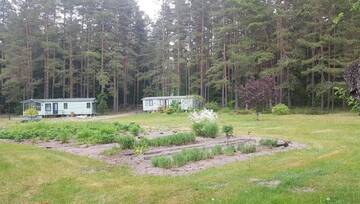 Фото номера Дом с 2 спальнями Дома для отпуска Romantic HOLIDAY HOME in the pine forest г. Скулте 49