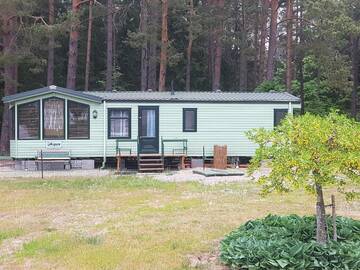 Фото номера Дом с 2 спальнями Дома для отпуска Romantic HOLIDAY HOME in the pine forest г. Скулте 46