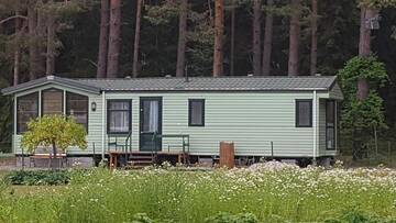 Фото номера Дом с 2 спальнями Дома для отпуска Romantic HOLIDAY HOME in the pine forest г. Скулте 47