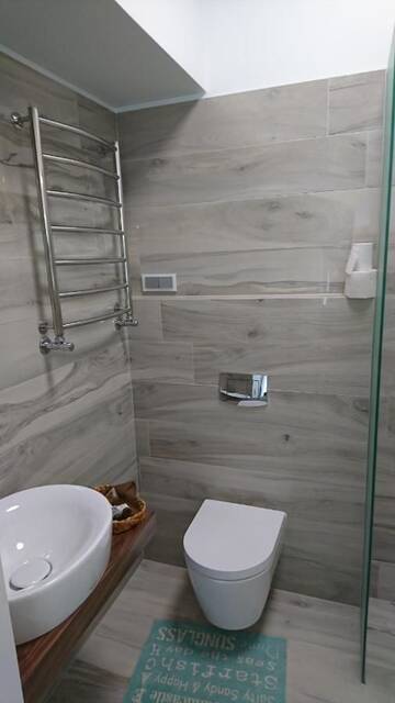Фото номера Номер с кроватью размера «queen-size», вид на море Загородные дома Guest House Vidlauči г. Скулте 8