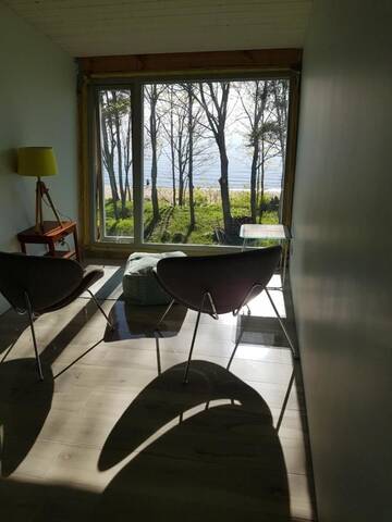Фото номера Номер с кроватью размера «queen-size», вид на море Загородные дома Guest House Vidlauči г. Скулте 3