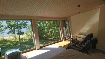 Фото номера Улучшенный номер с кроватью размера «king-size» Загородные дома Guest House Vidlauči г. Скулте 4